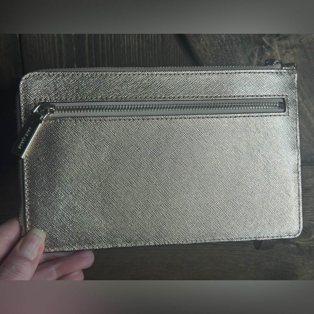 Kate Spade Gold Metallic wristlet 
Pre-loved -good condition - Picture 2 of 5